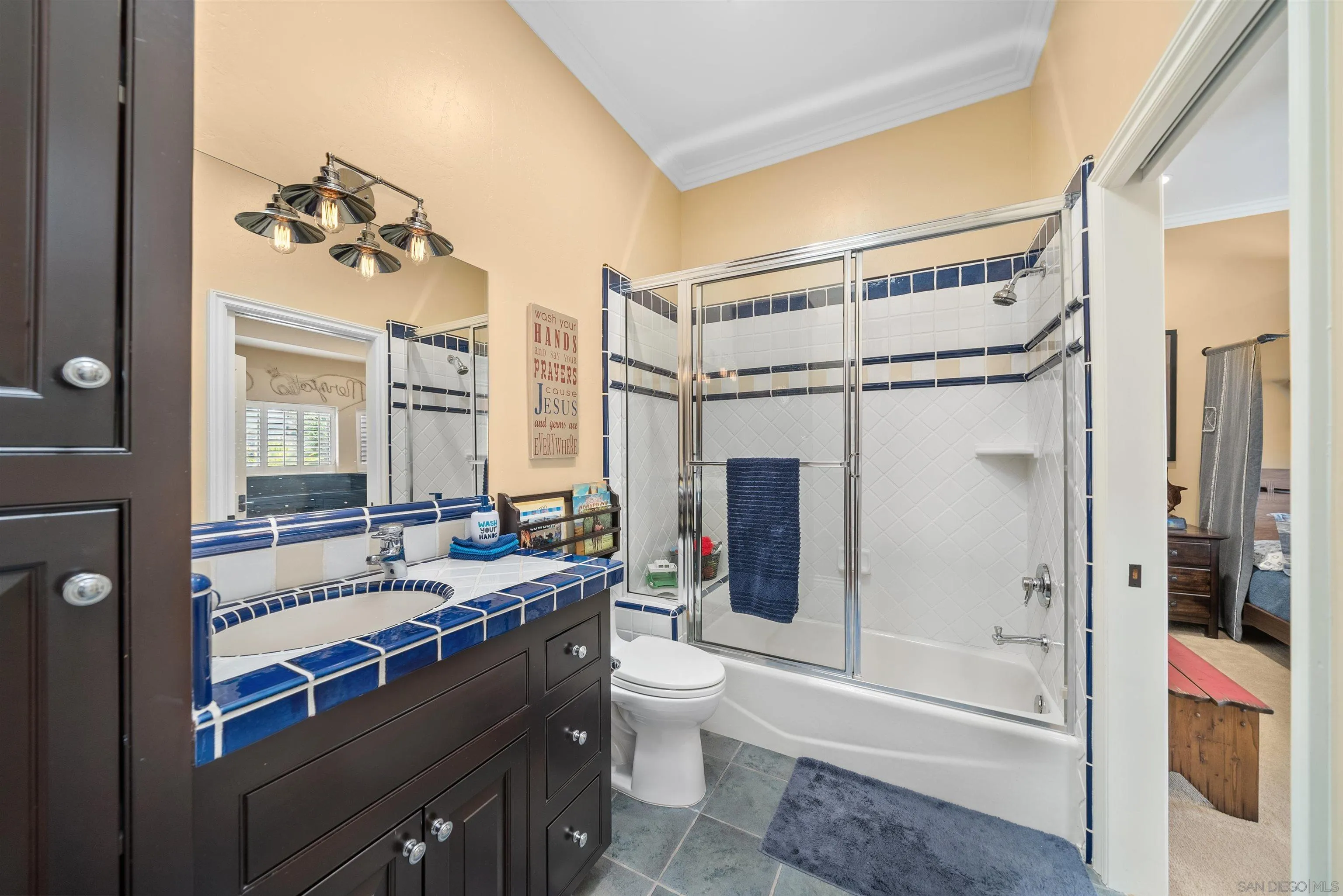 3307 Wentworth Drive Jamul, CA 91935 - Photo 48 of 75 a bathroom with a double vanity sink toilet mirror and shower