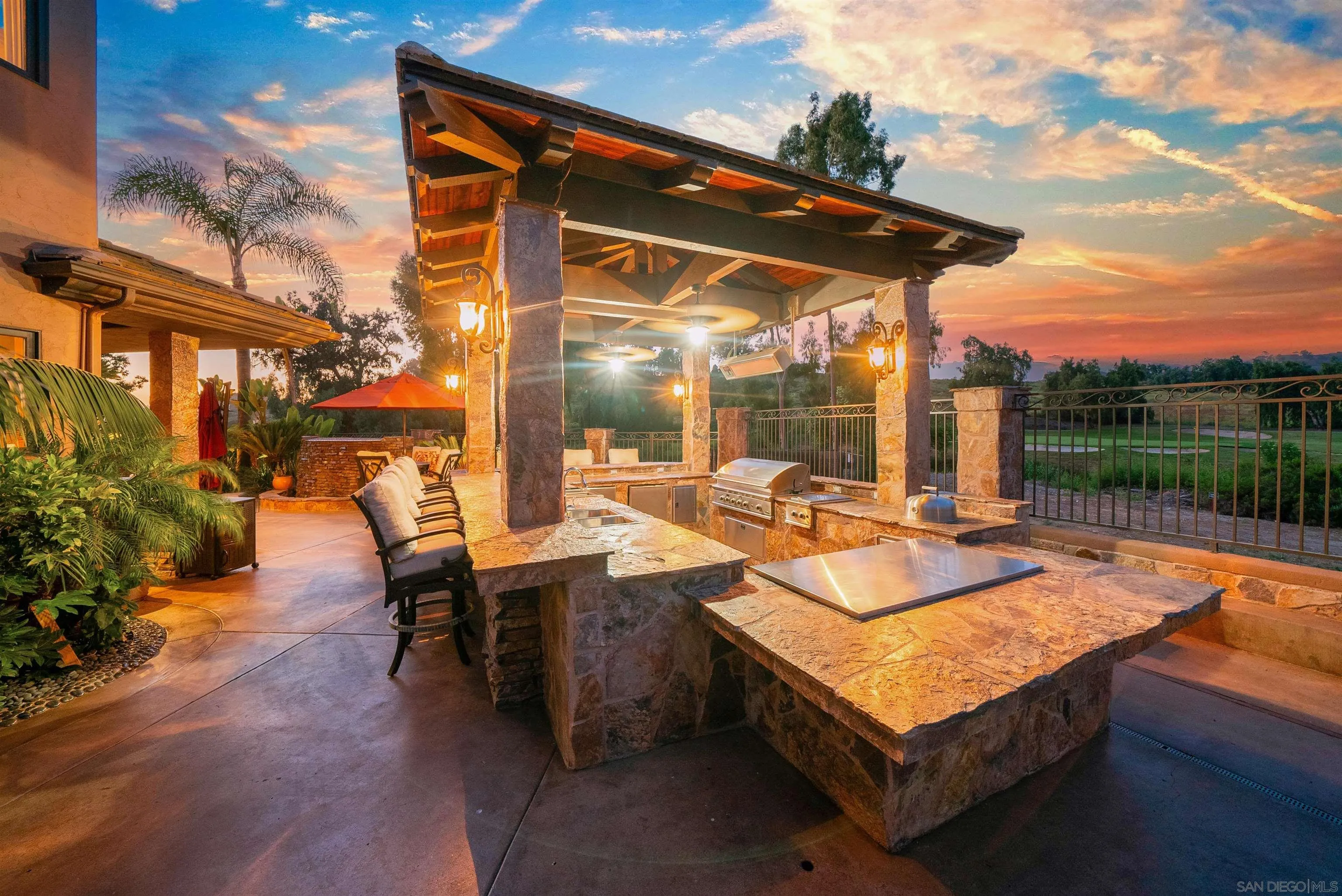 3307 Wentworth Drive Jamul, CA 91935 - Photo 64 of 75 a view of a patio with a table chairs and a backyard