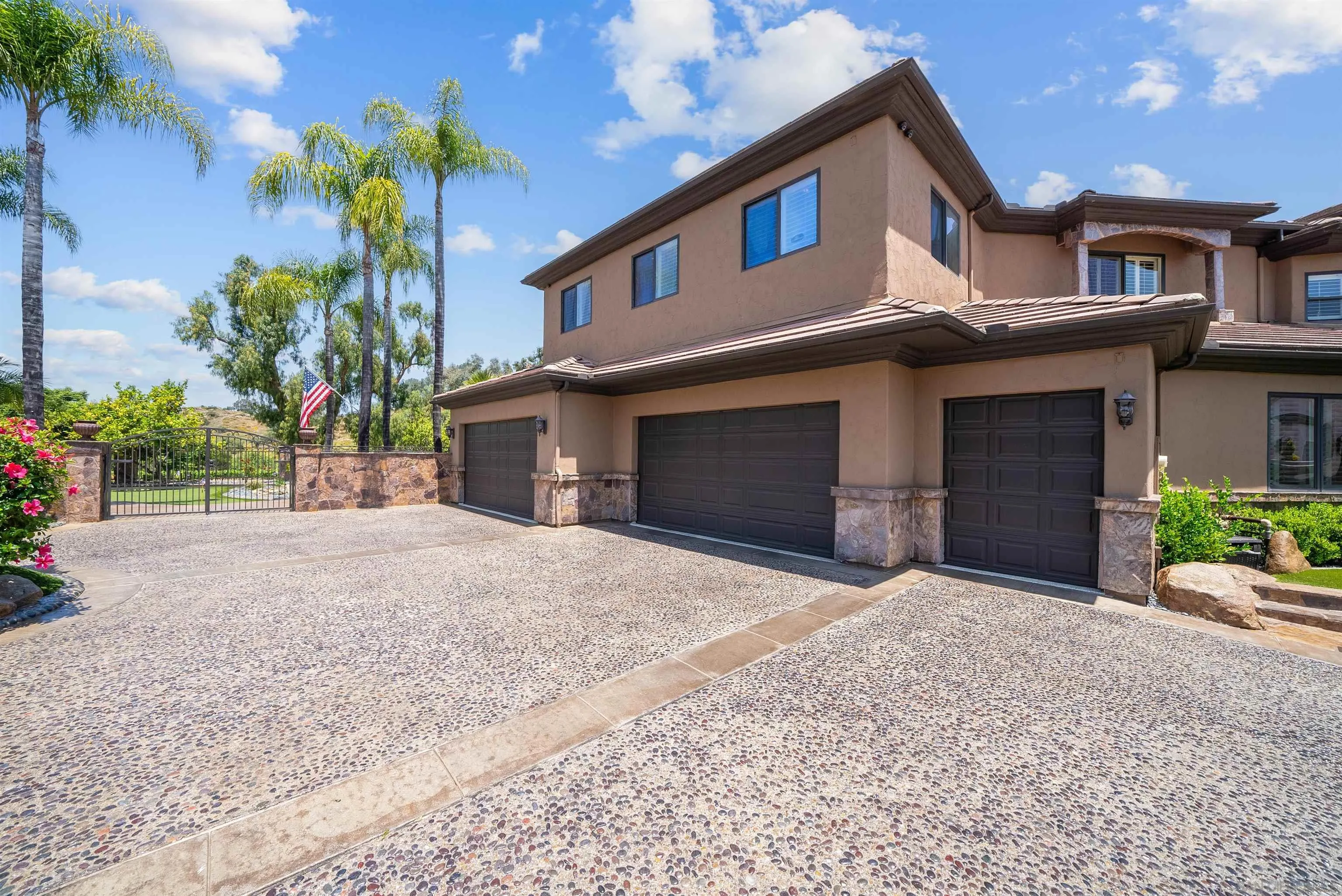 3307 Wentworth Drive Jamul, CA 91935 - Photo 73 of 75 a front view of a house with a yard and garage