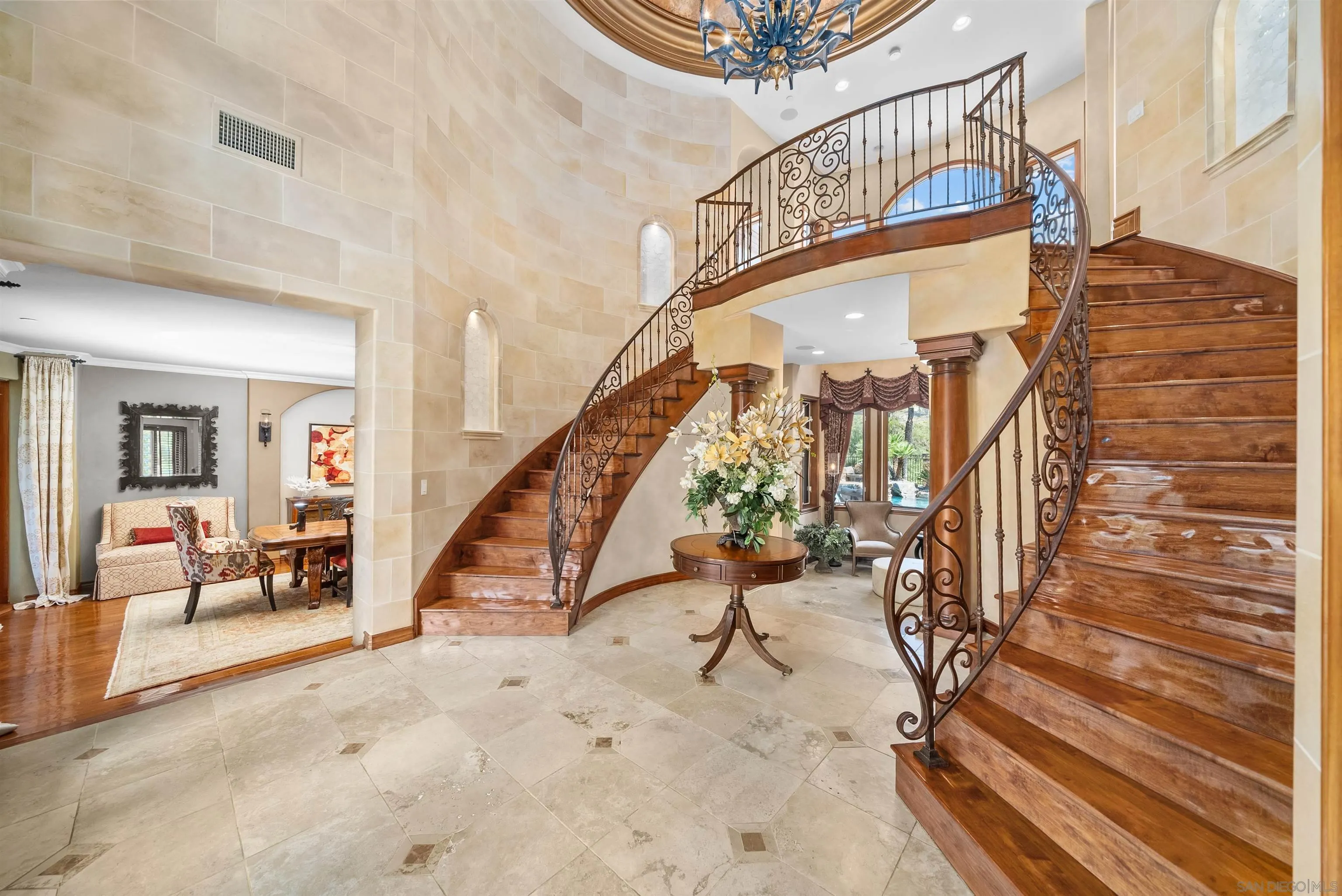 3307 Wentworth Drive Jamul, CA 91935 - Photo 8 of 75 a view of staircase with furniture and a chandelier
