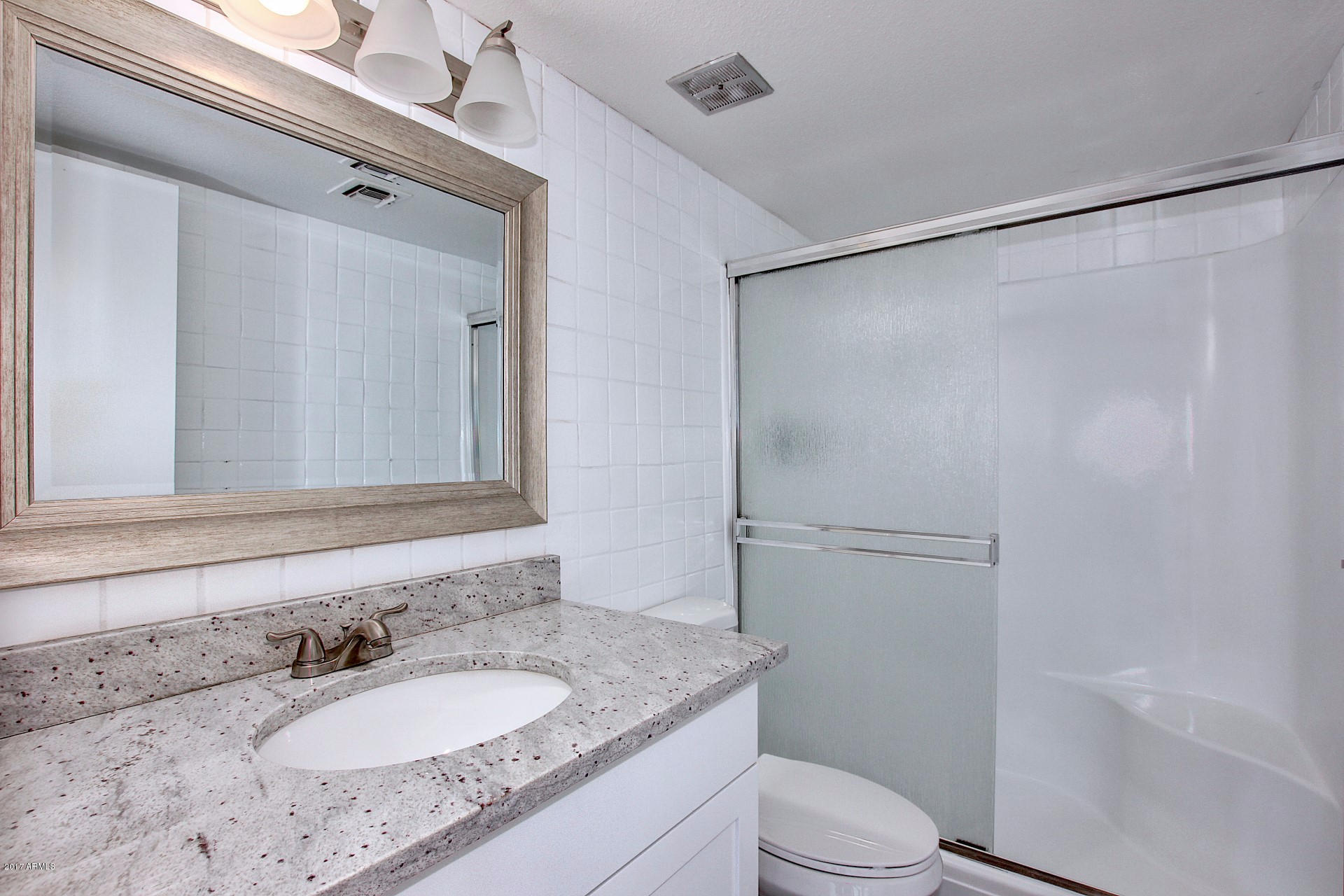 4201 East Camelback Road, Unit 108 Phoenix, AZ 85018 - Photo 8 of 9 Guest Bathroom
