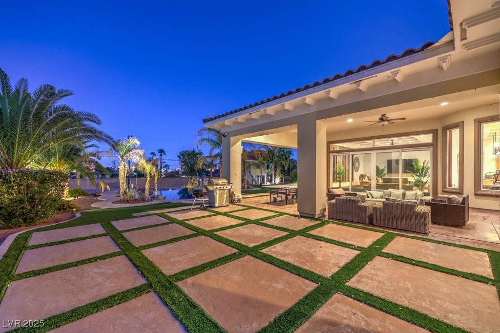 2780 El Camino Road Las Vegas, NV 89146 - Photo 11 of 91 Patio at twilight with outdoor lounge area, a patio area, and ceiling fan