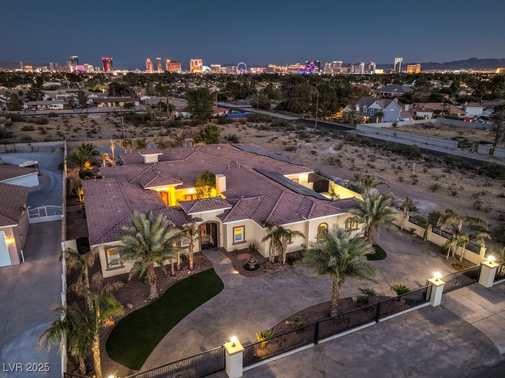 2780 El Camino Road Las Vegas, NV 89146 - Photo 18 of 91 Aerial view at twilight of a view of city lights