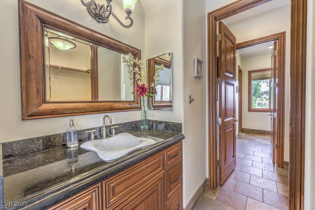 2780 El Camino Road Las Vegas, NV 89146 - Photo 55 of 91 Bathroom featuring vanity and baseboards
