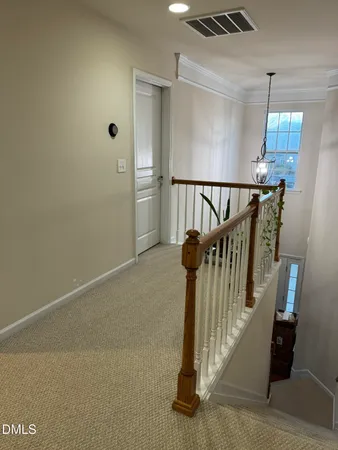 a view of entryway with stairs