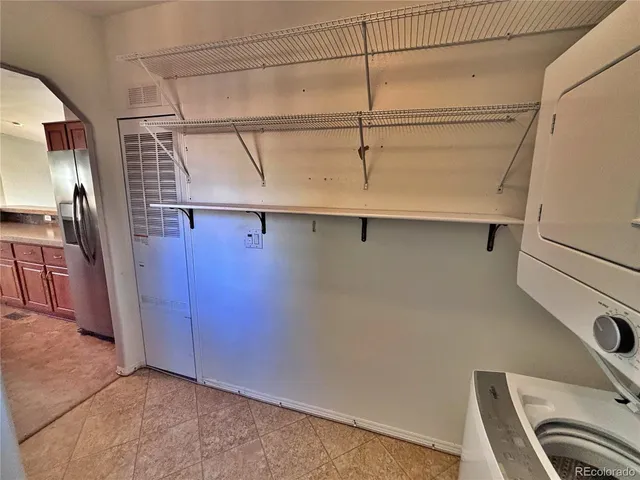 a bathroom with a sink toilet tub and shower