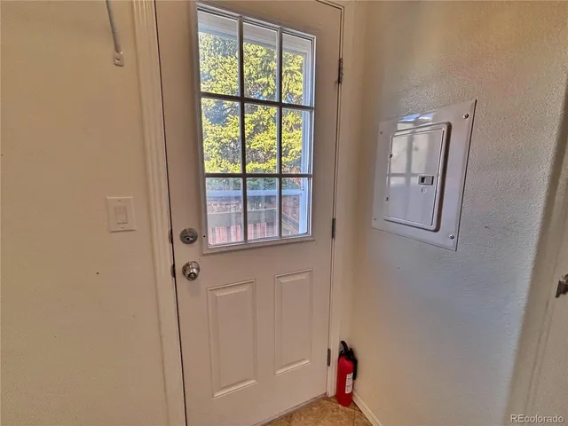 a view of a backyard with furniture and tub view