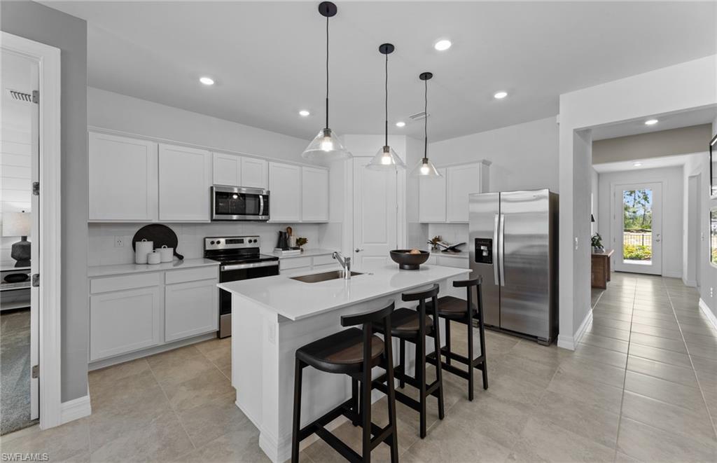 44619 Emerald Street Punta Gorda, FL 33982 - Photo 4 of 23 Photos are from a furnished model. Options for this home may vary.