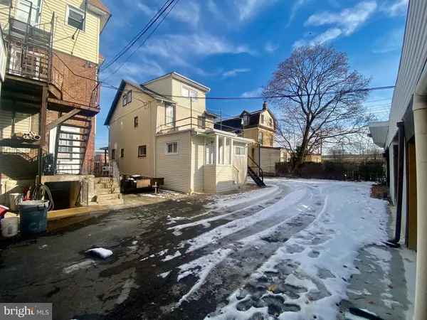 a view of a house with a snow in front of it