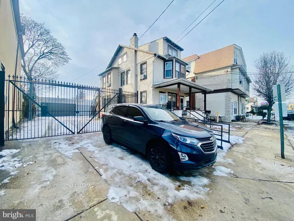 a car parked in front of house