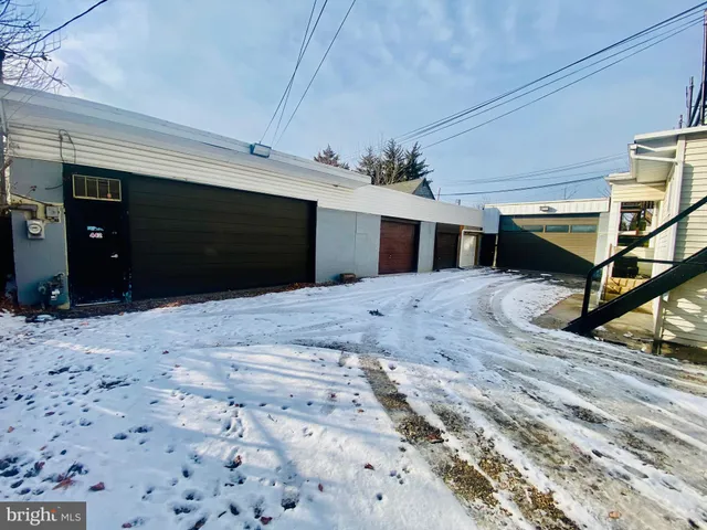 a view of a backyard of a house