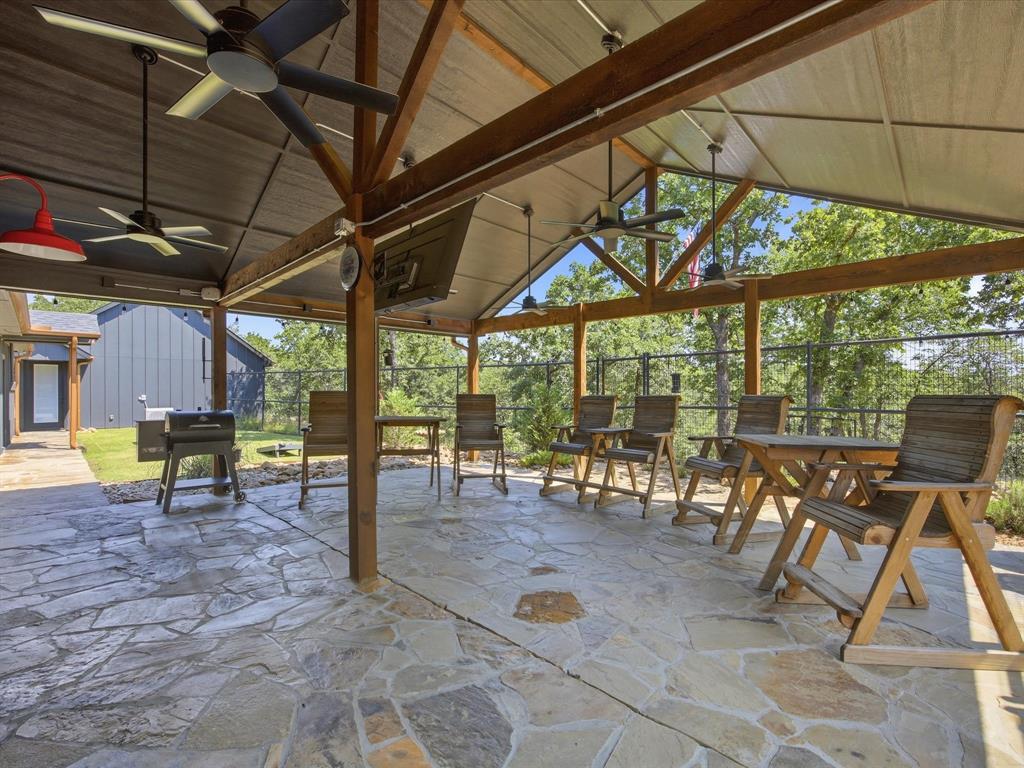 117 Ranchview Court Bowie, TX 76230 - Photo 25 of 40 a view of a room with table and chairs