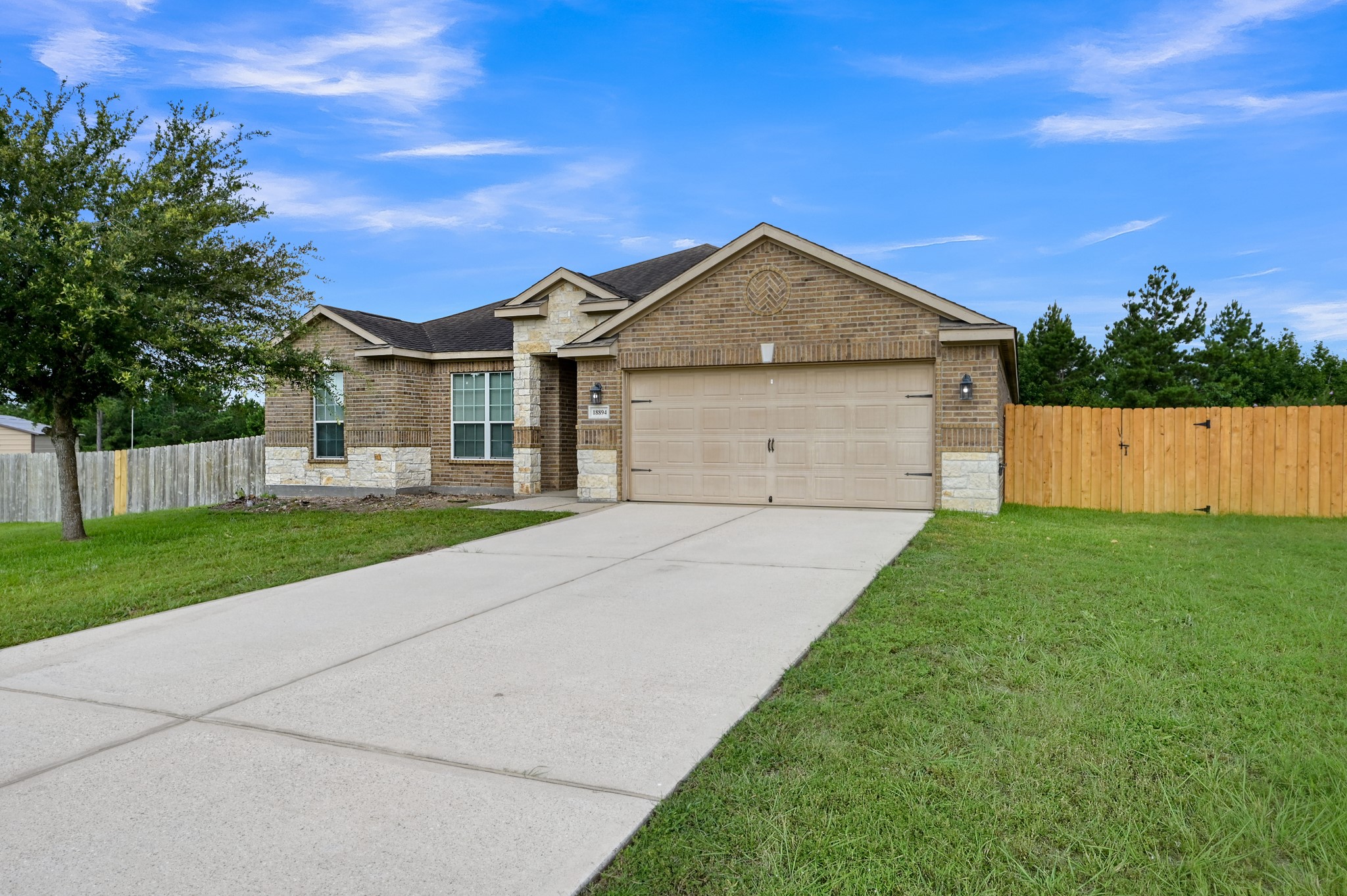 18894 Maverick Ranch Road West Magnolia, TX 77355 - Photo 3 of 43 New Fence and gate on the right side.