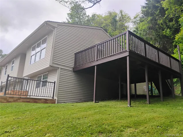 a bathroom with a double vanity sink and a shower