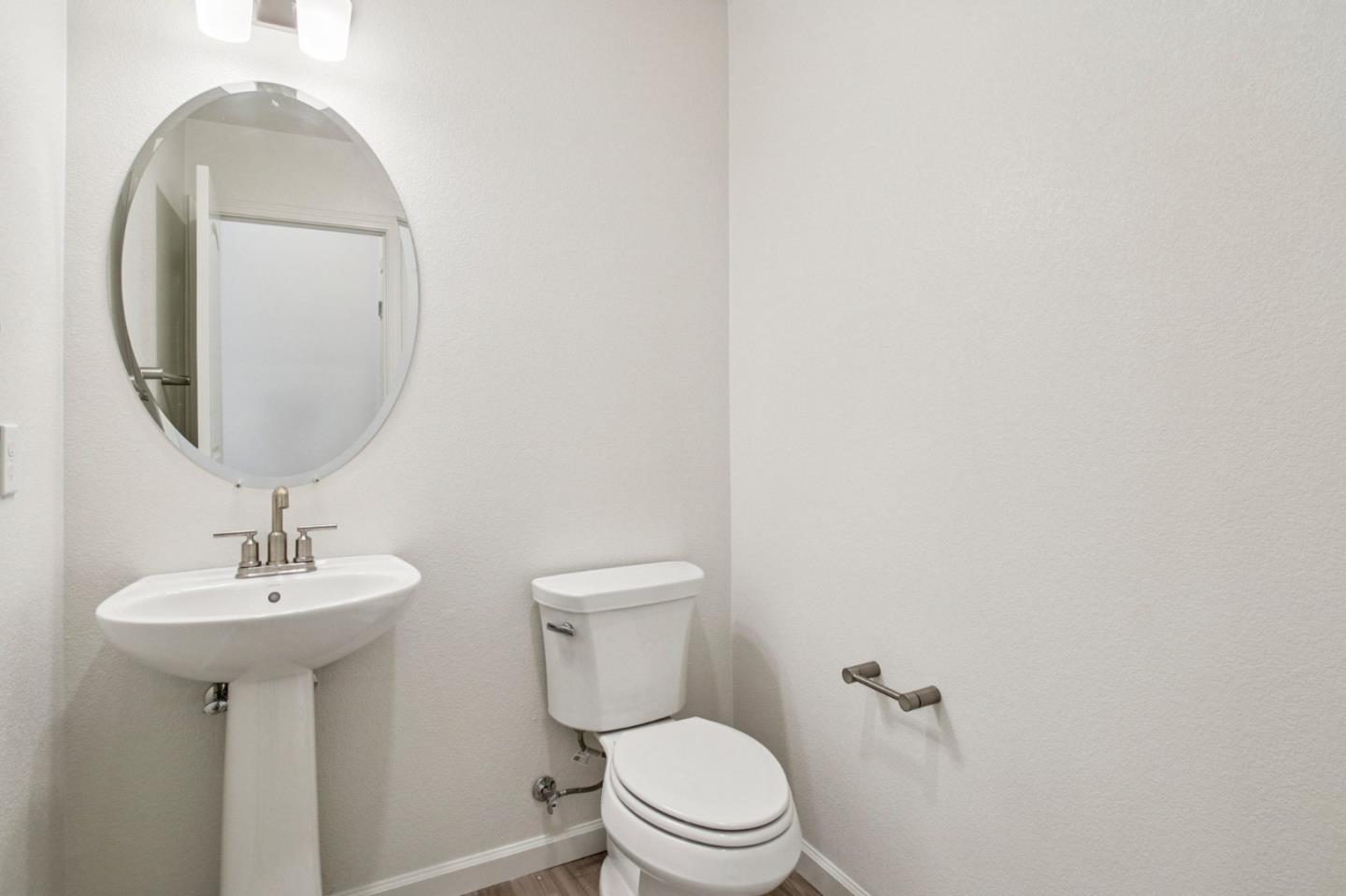 3769 Castro Valley Boulevard Castro Valley, CA 94546 - Photo 14 of 33 a bathroom with a toilet sink and mirror