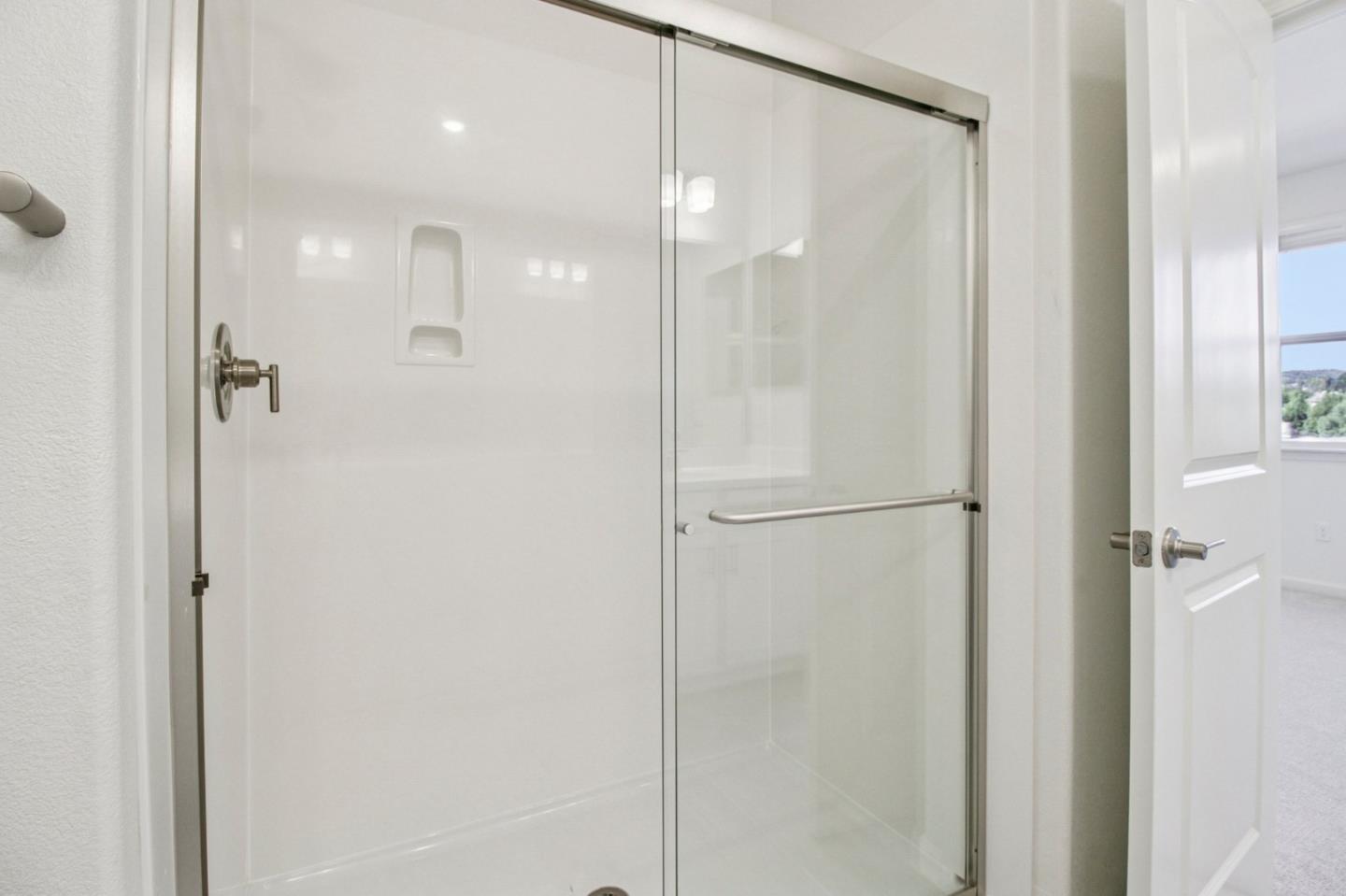 3769 Castro Valley Boulevard Castro Valley, CA 94546 - Photo 29 of 33 a bathroom with a glass shower door