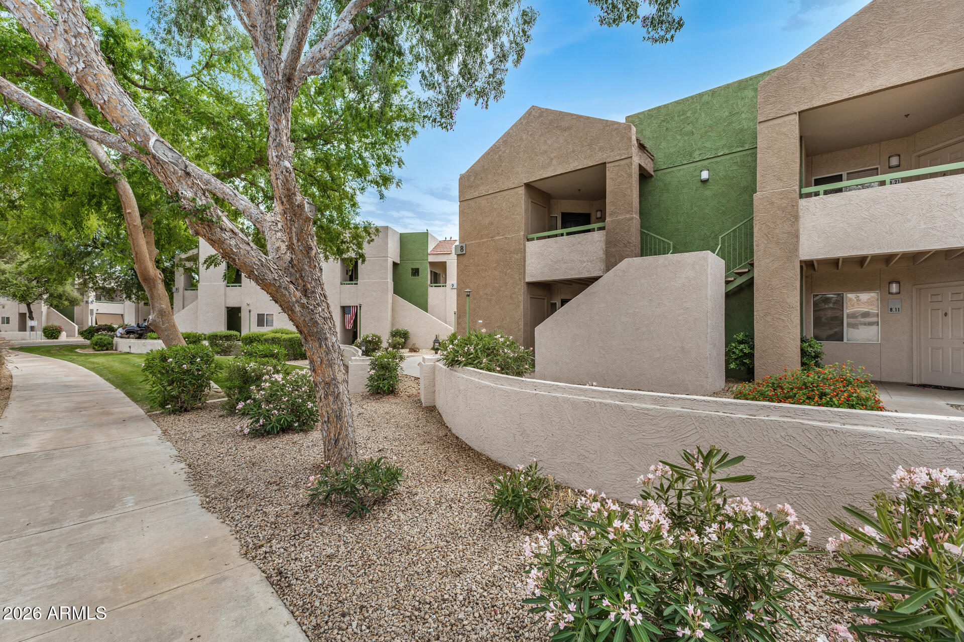 1295 North Ash Street, Unit 828 Gilbert, AZ 85233 - Photo 30 of 43 front view of a house with a yard