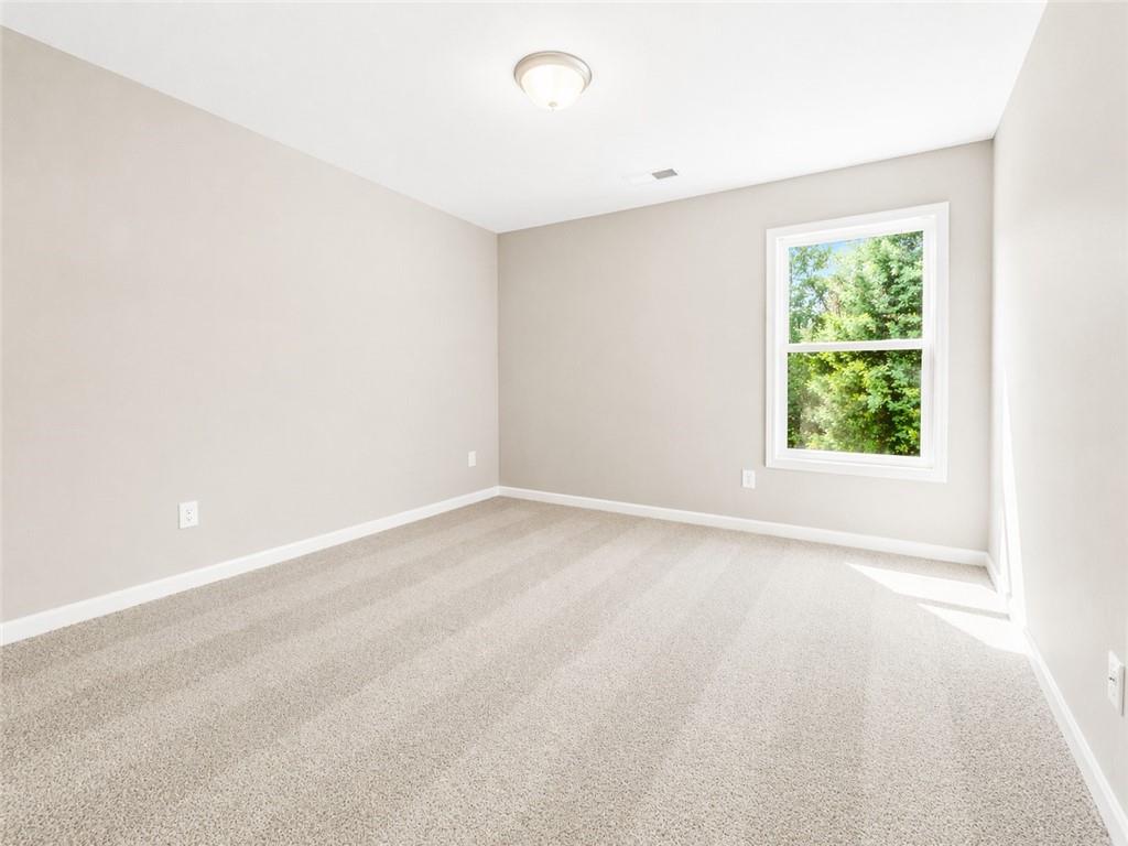 524 Rippling Court Temple, GA 30179 - Photo 10 of 19 an empty room with a window
