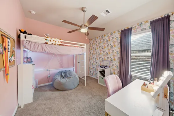 a bathroom with a sink vanity and a mirror