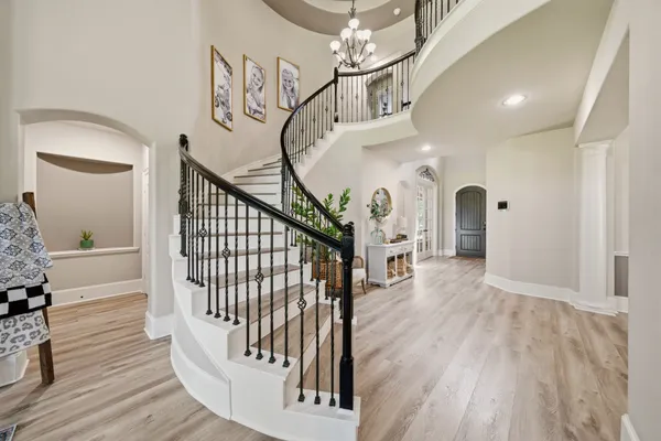 a view of entryway with wooden floor