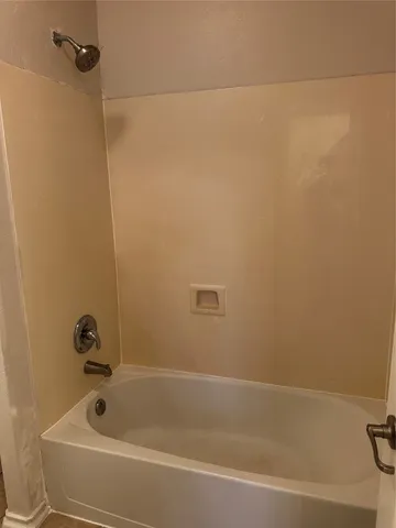 a bathroom with a tub