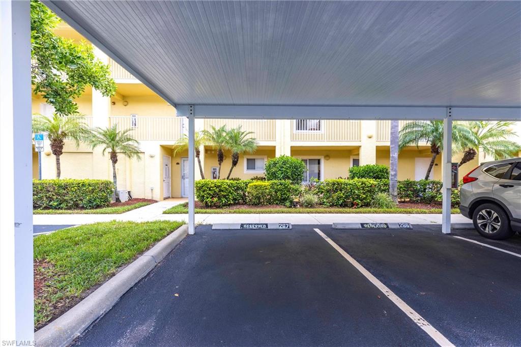 8274 Key Royal Circle, Unit 1036 Naples, FL 34119 - Photo 25 of 45 View of covered parking lot