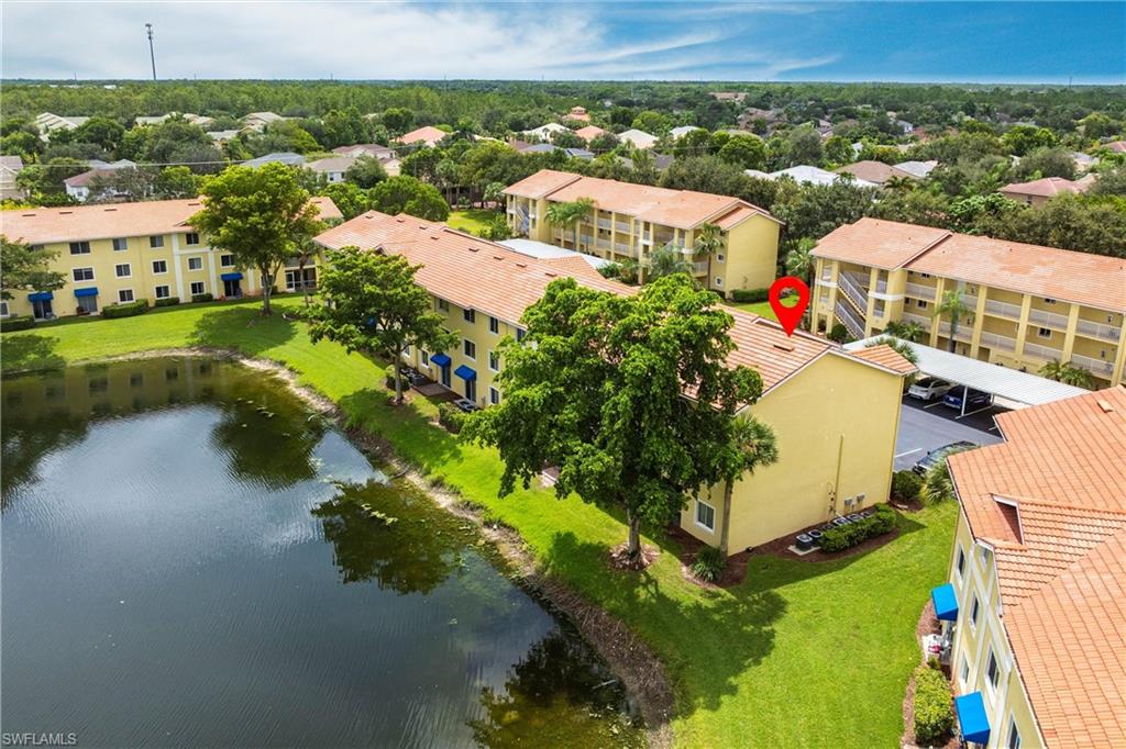 8274 Key Royal Circle, Unit 1036 Naples, FL 34119 - Photo 3 of 45 Bird's eye view of a nearby body of water
