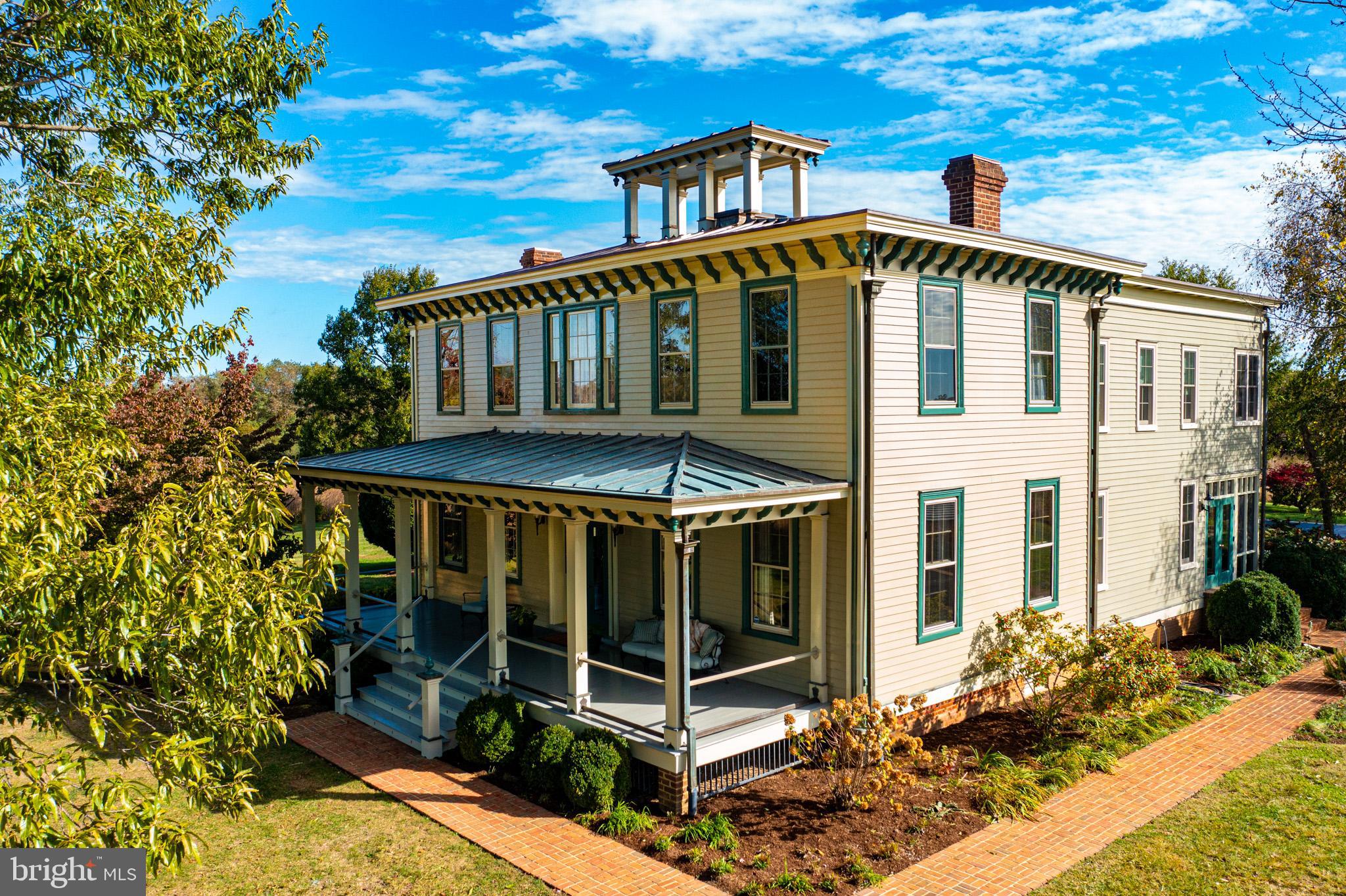 a front view of a house with balcony