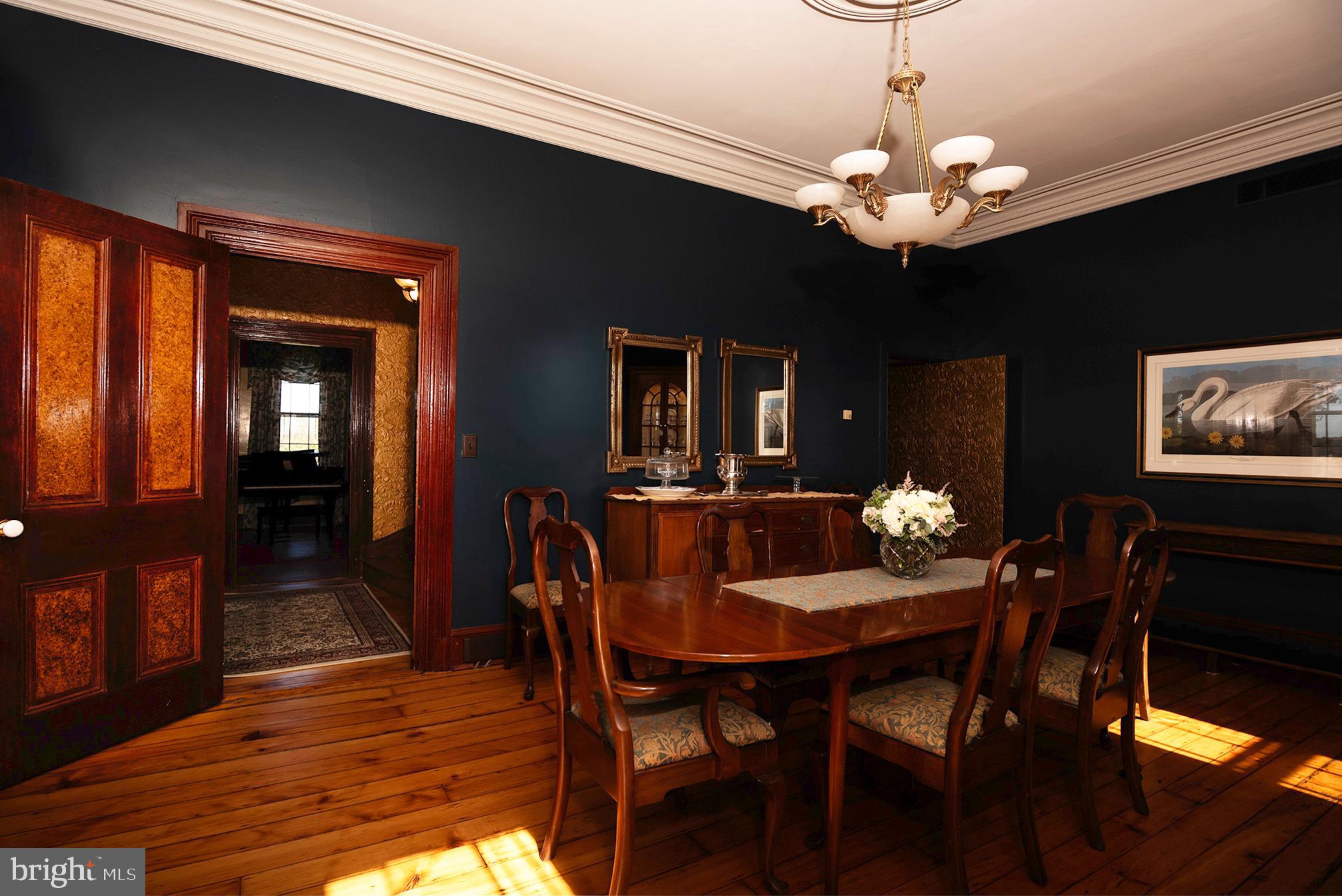 10121 Fairlee Road Chestertown, MD 21620 - Photo 14 of 66 a view of a dining room with furniture and wooden floor