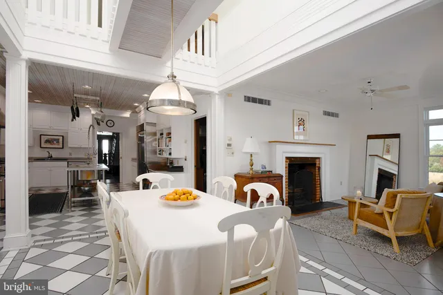 a living room with couch and a large window