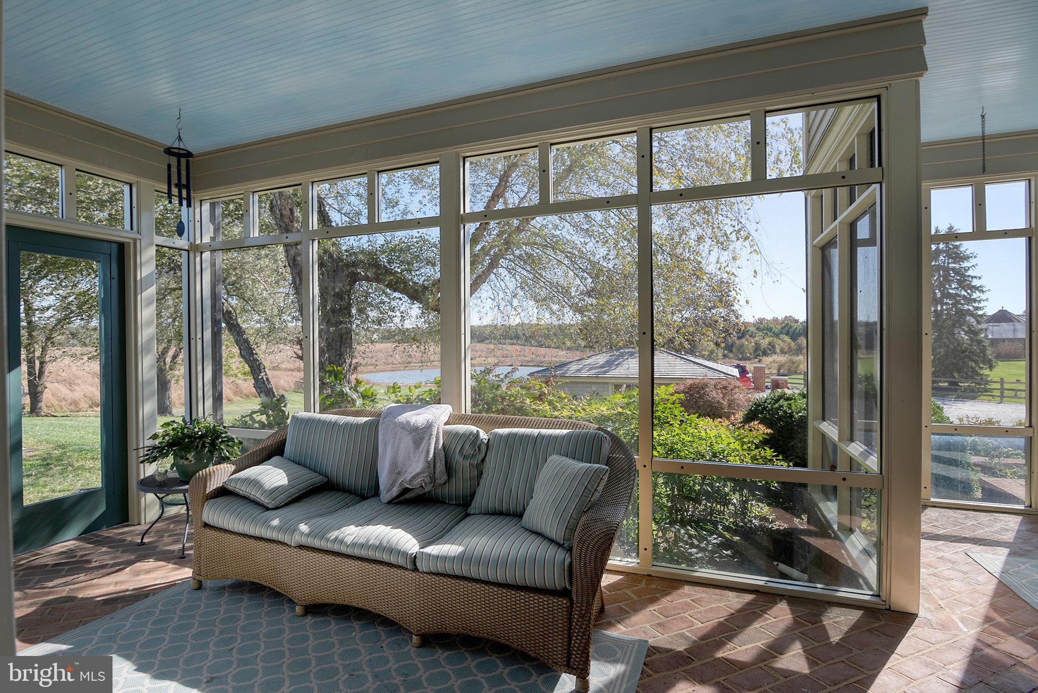 10121 Fairlee Road Chestertown, MD 21620 - Photo 27 of 66 a living room with couch and a large window