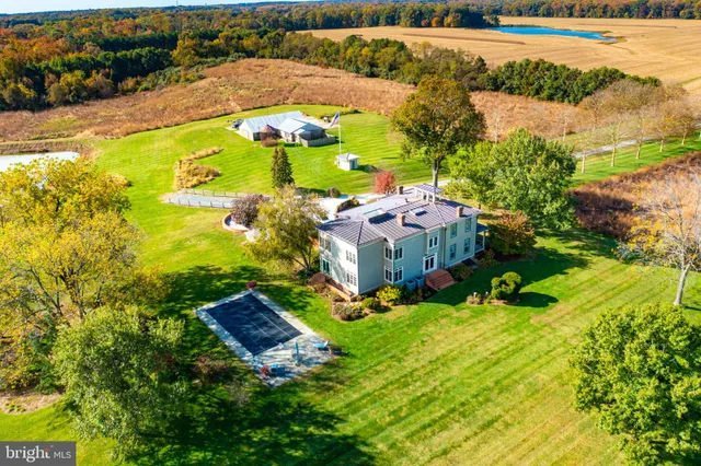 an aerial view of a house with a garden