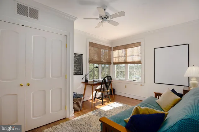 a view of a patio with table and chairs