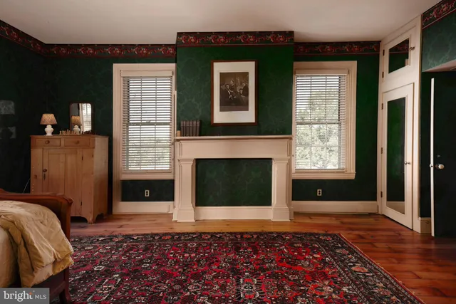 a view of a balcony with chairs