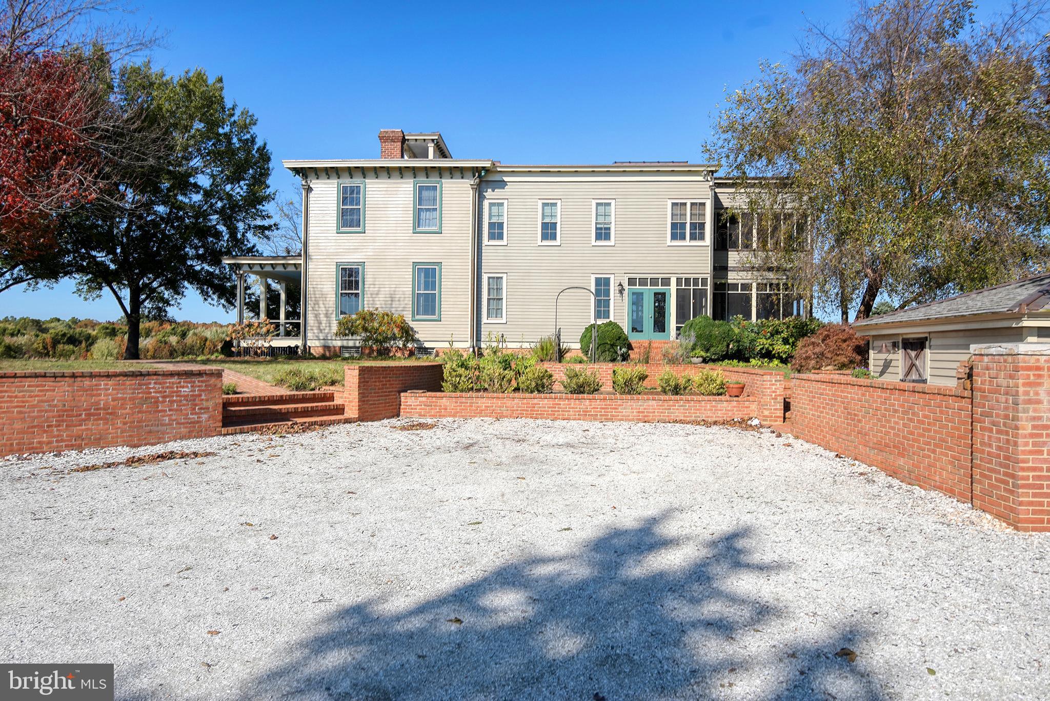 10121 Fairlee Road Chestertown, MD 21620 - Photo 48 of 66 a front view of a house with a yard