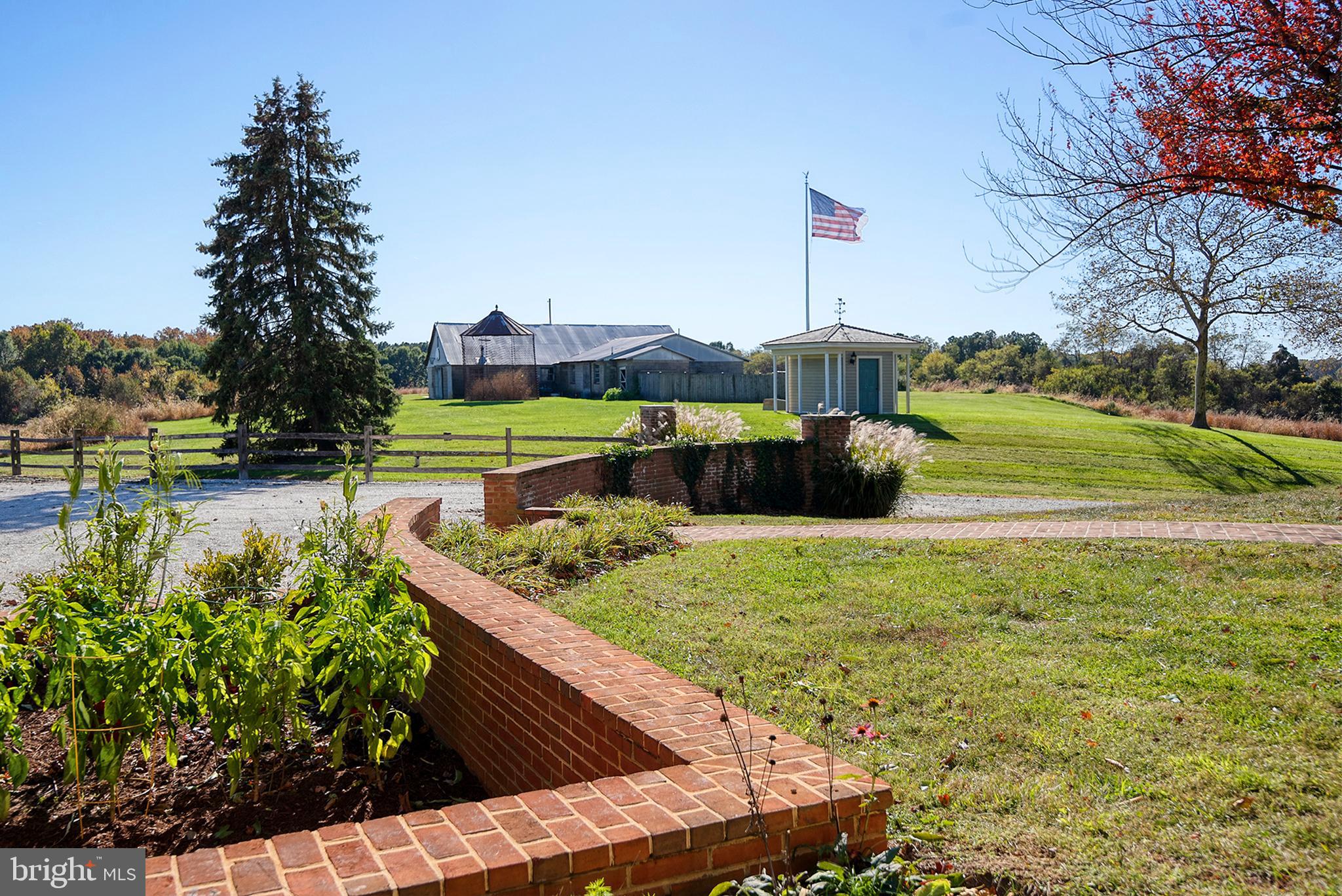 10121 Fairlee Road Chestertown, MD 21620 - Photo 50 of 66 a view of a garden with an outdoor seating