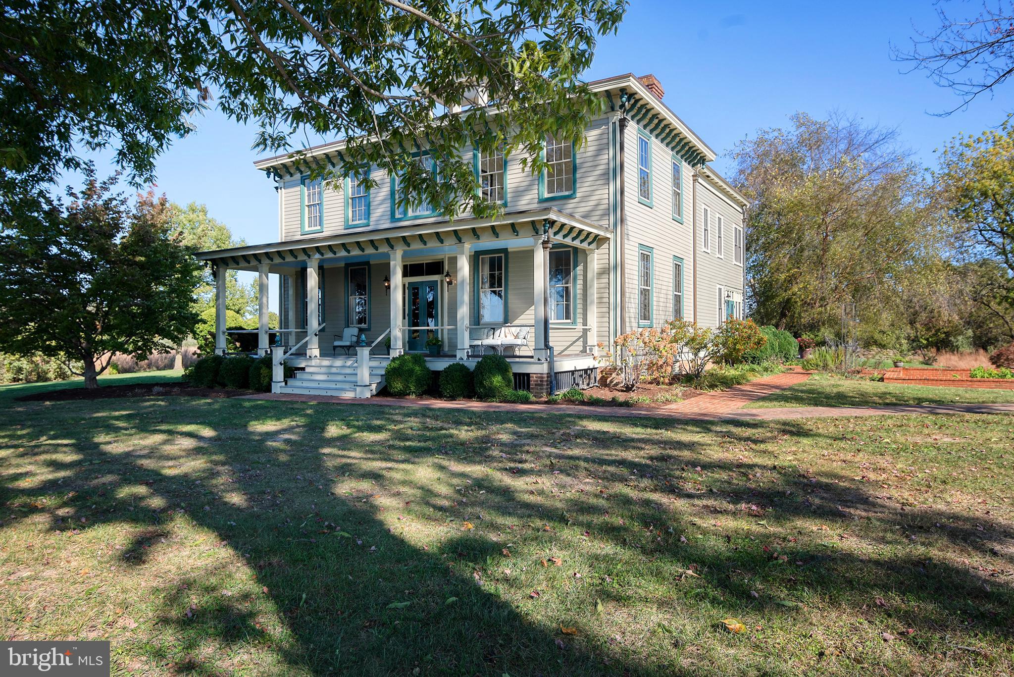 10121 Fairlee Road Chestertown, MD 21620 - Photo 6 of 66 a front view of a house with a yard