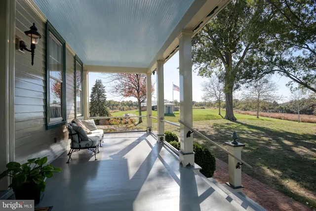 a view of living room and dining room