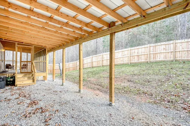a view of an empty room with a sliding door
