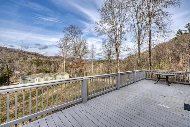 a view of outdoor space with wooden deck