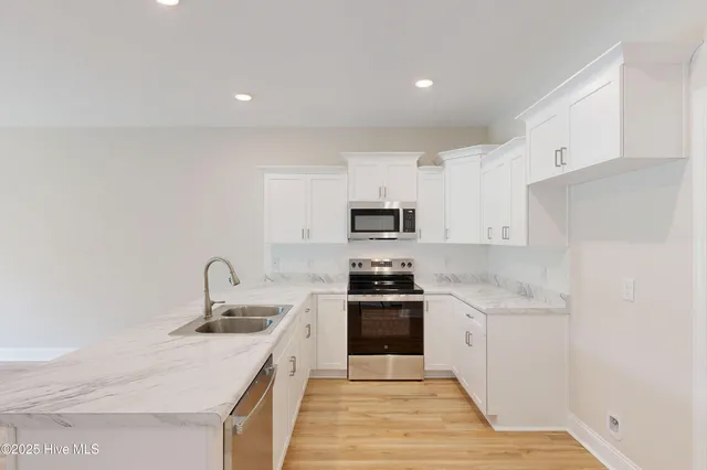 $299,900 | 209 Sandpiper Place, Holly Ridge, NC 28445