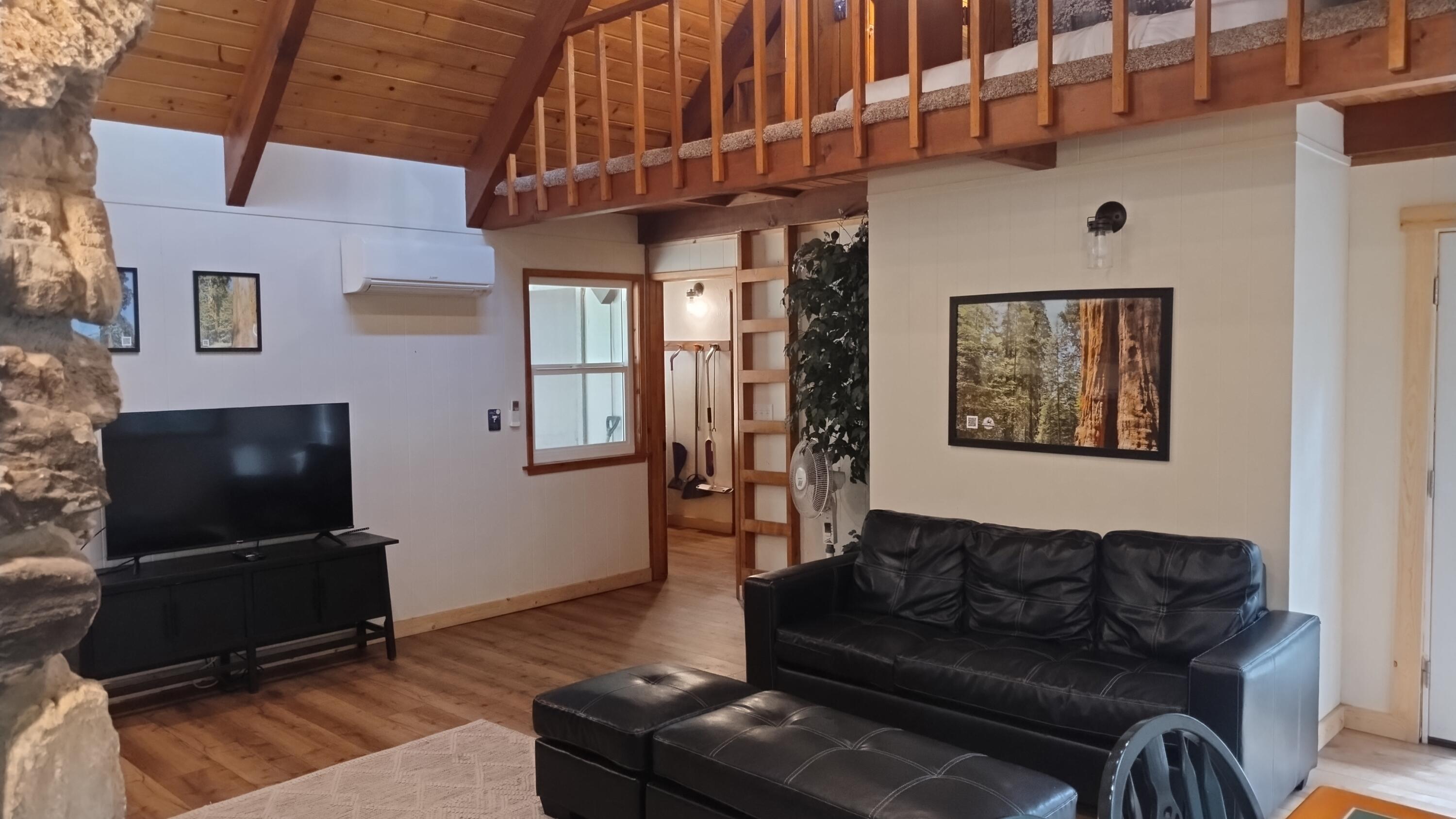 1693 Forest Rte 21S94 Camp Nelson, CA 93265 - Photo 33 of 86 a living room with furniture and a flat screen tv