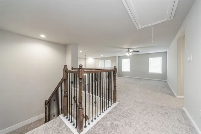 a view of hallway with stairs
