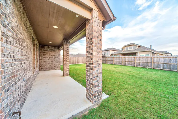 a view of a porch with a backyard