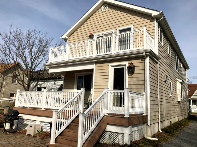 a view of a house with a deck