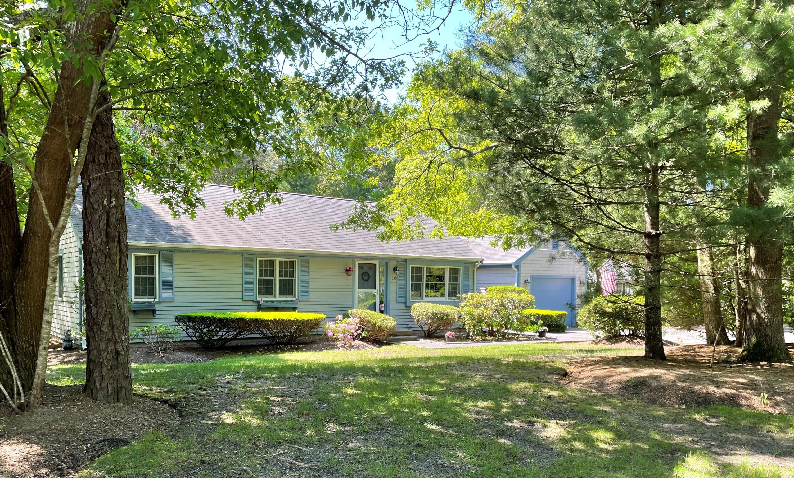 935 Bumps River Road Centerville, MA 02632 - Photo 1 of 14 a view of a house with a yard porch and sitting area