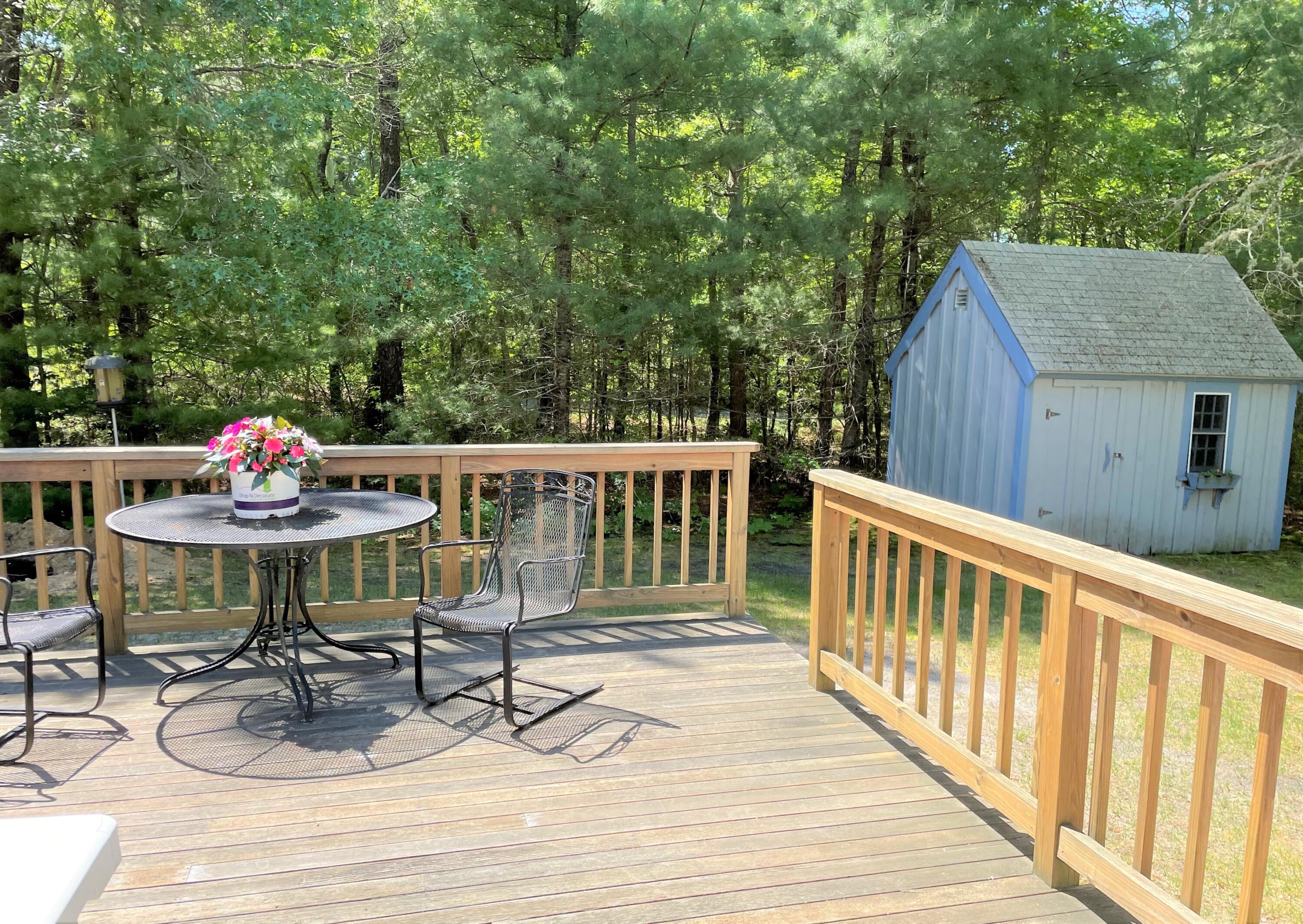 935 Bumps River Road Centerville, MA 02632 - Photo 12 of 14 a view of balcony with wooden floor and seating space