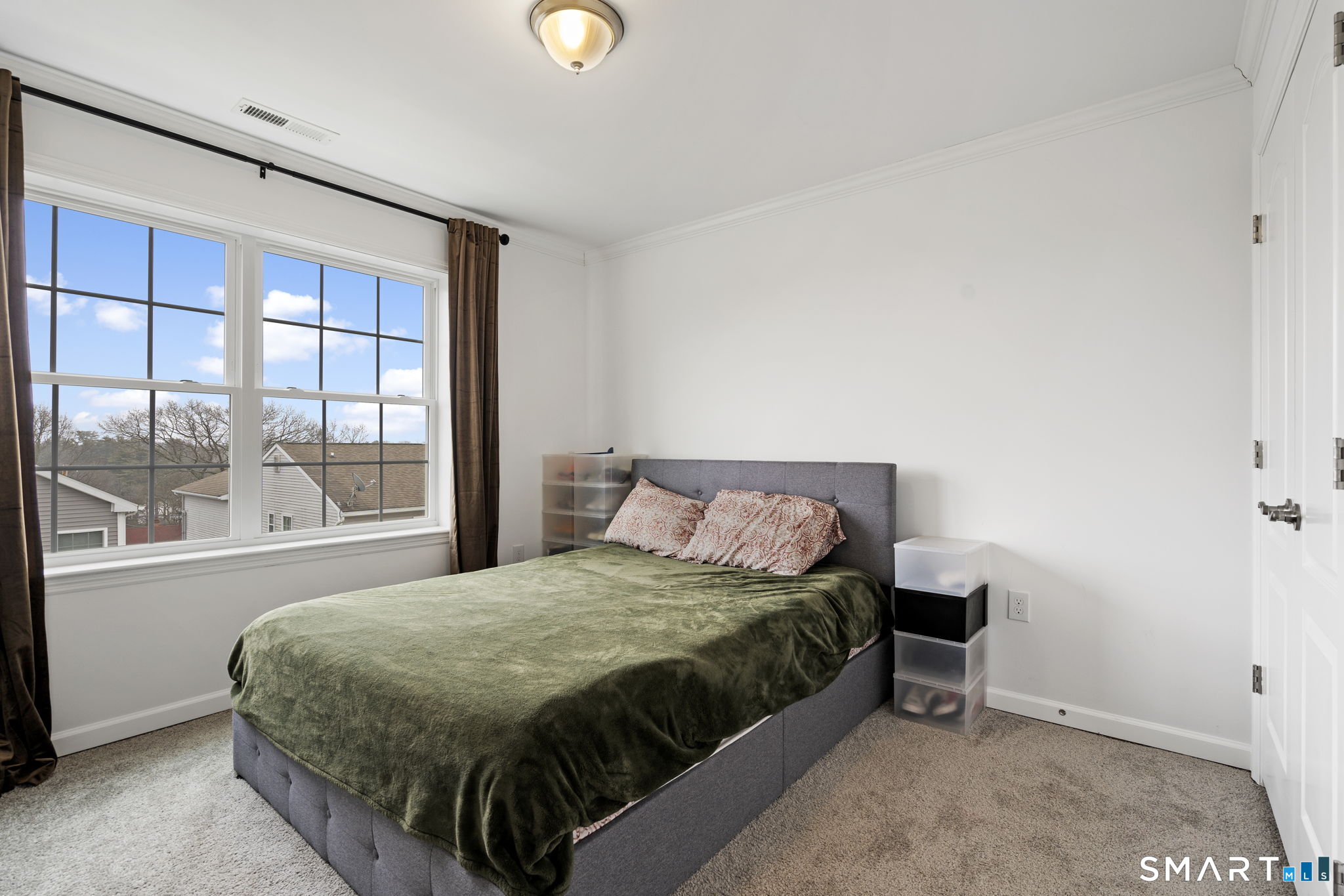 156 Dayton Road Bridgeport, CT 06606 - Photo 17 of 28 a bedroom with a bed and large window