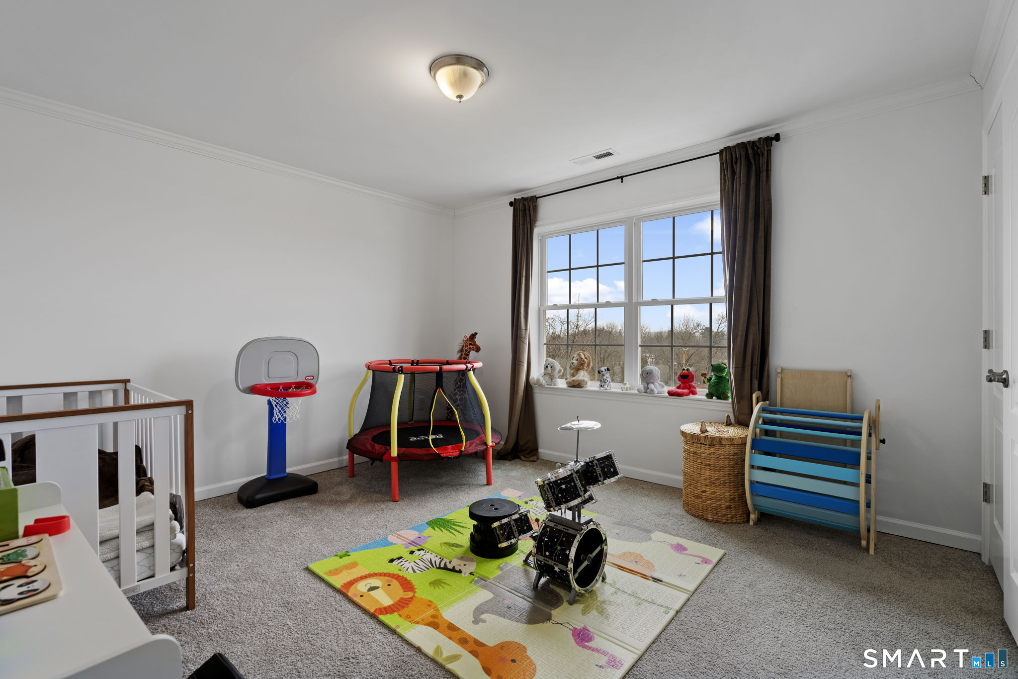 156 Dayton Road Bridgeport, CT 06606 - Photo 18 of 28 a room with gym equipment and a large window