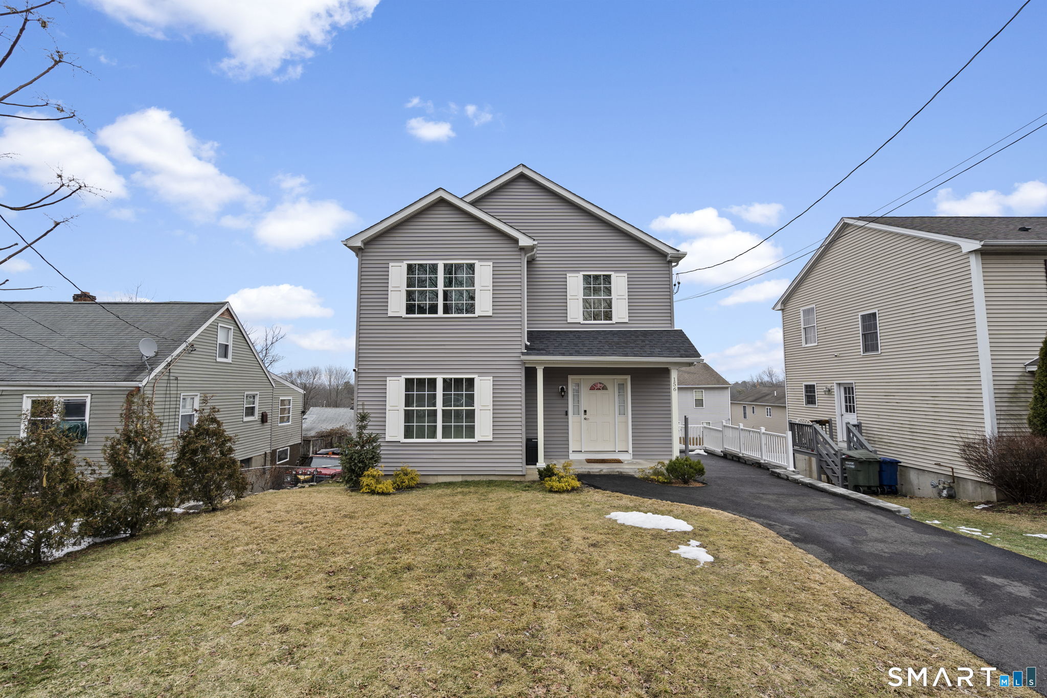 156 Dayton Road Bridgeport, CT 06606 - Photo 2 of 28 a front view of a house with a yard